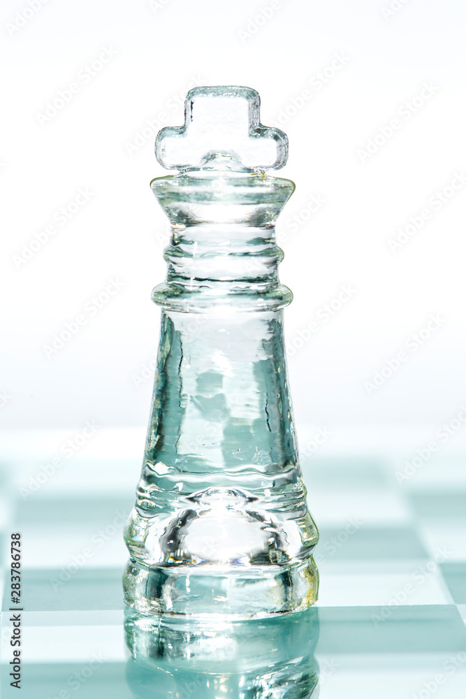 Chess glass transparent king isolated on white Chess glass transparent king isolated on white