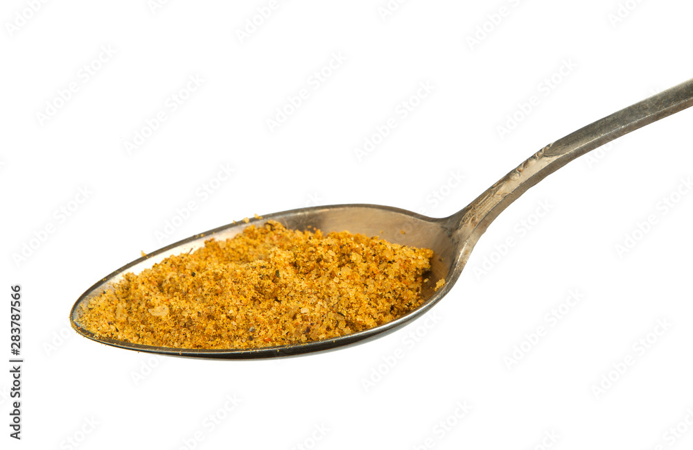 A mixture of seasonings in a bowl isolated on a white background. Spice on isolate. View from above. A mixture of seasonings in a bowl isolated on a white background. Spice on isolate. View from above.