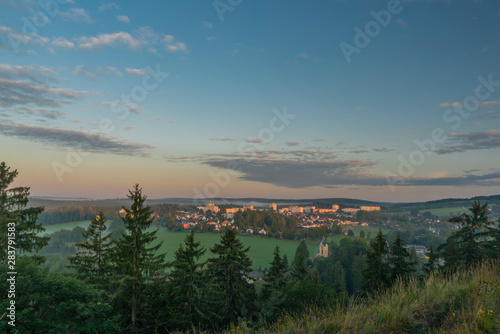 Rotava town in sunrise time with block of flats in summer morning photo