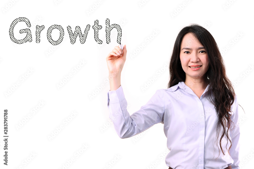 businesswoman drawing word growth by marker pen businesswoman drawing word growth by marker pen