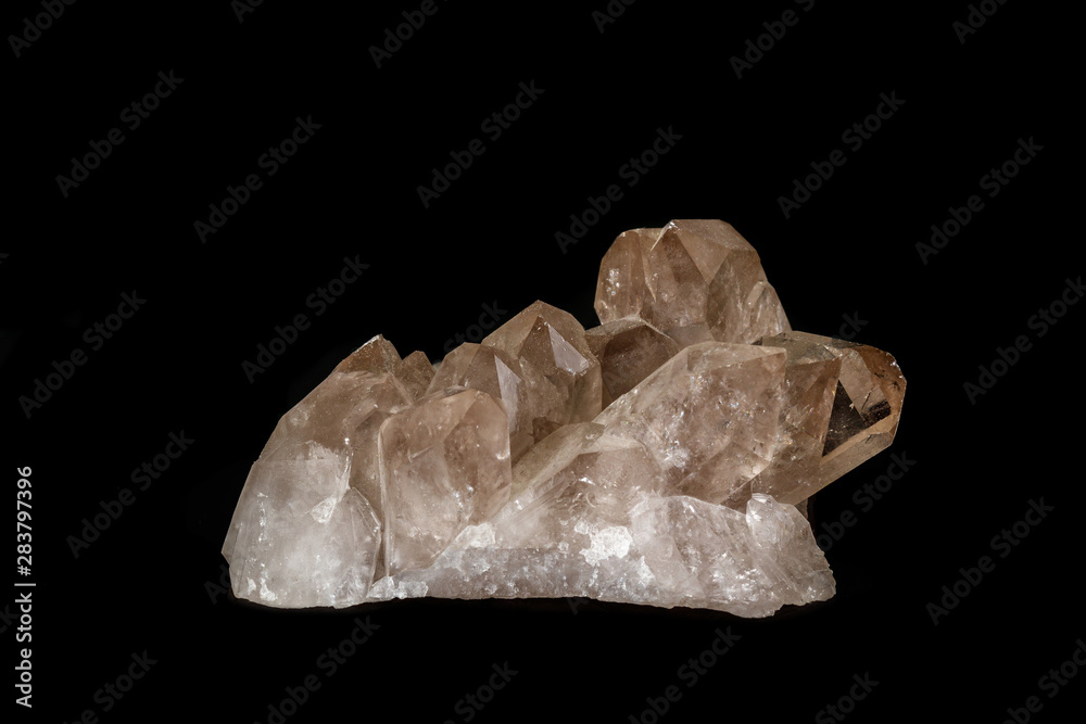 Macro mineral stone smoky quartz, rauchtopaz on a black background Macro mineral stone smoky quartz, rauchtopaz on a black background