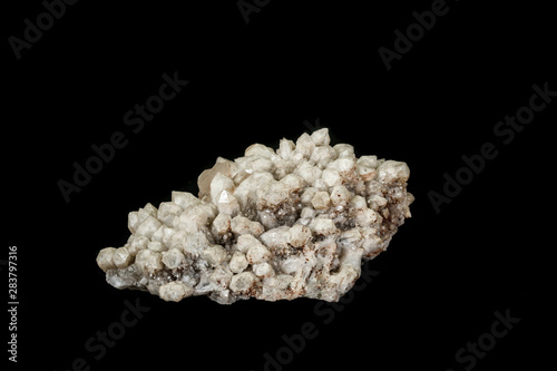 Macro mineral stone quartz calcite on a black background