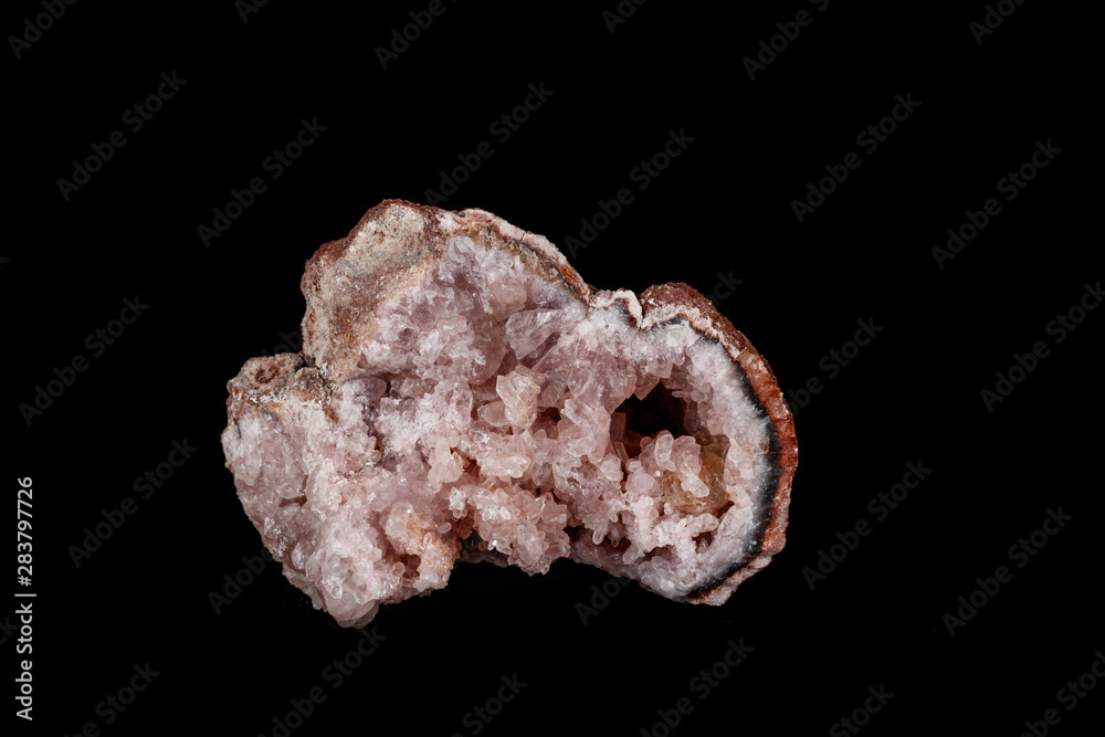Macro mineral stone Pink Amethyst on a black background Macro mineral stone Pink Amethyst on a black background
