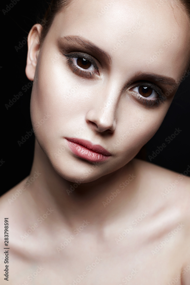 beautiful girl with big brown eyes and clean face