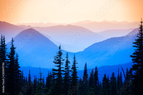 Fototapeta Naklejka Na Ścianę i Meble -  Hazy scenic view of mountain ranges in Mt. Rainier National Park.