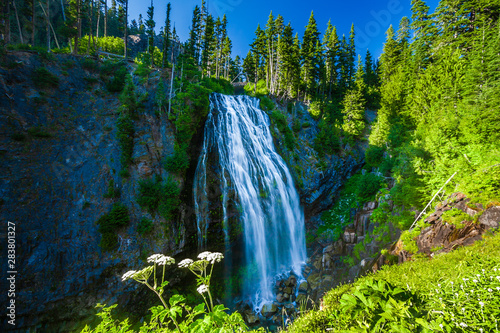 Narada Falls on a sunny blue sky day Mt. Rainier National Park. photo