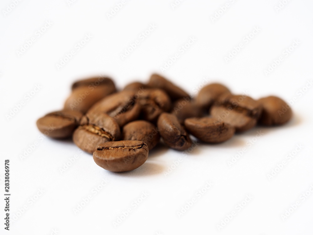 roasted coffee beans on white background roasted coffee beans on white background