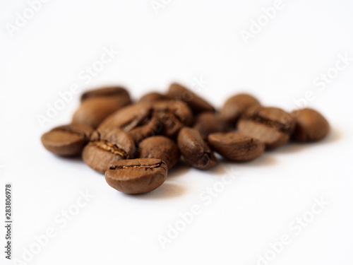 roasted coffee beans on white background