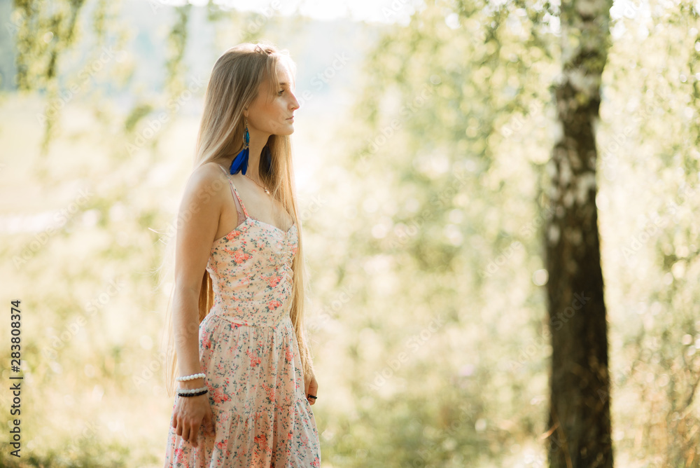 beautiful young girl with long hair in dress outdoors, cute woman walking in the park beautiful young girl with long hair in dress outdoors, cute woman walking in the park
