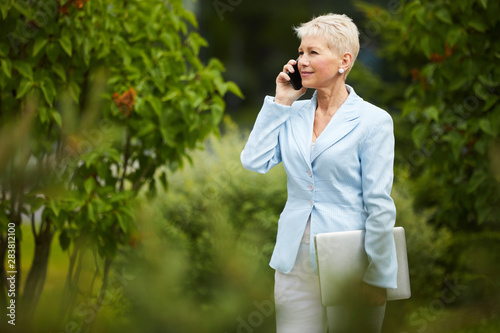 Businesswoman working on mobile phone