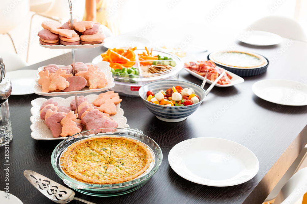 Easter cookies, quiche, caprese salad, and veggie tray Easter cookies, quiche, caprese salad, and veggie tray