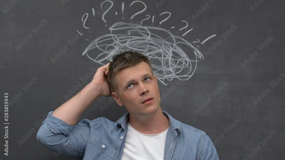 Confused man thinking and scratching head, developing idea, new project, startup Confused man thinking and scratching head, developing idea, new project, startup