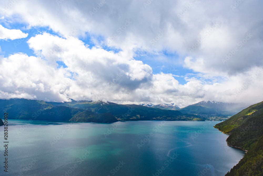 Norwegian fjords, mountains and sky panorama view
