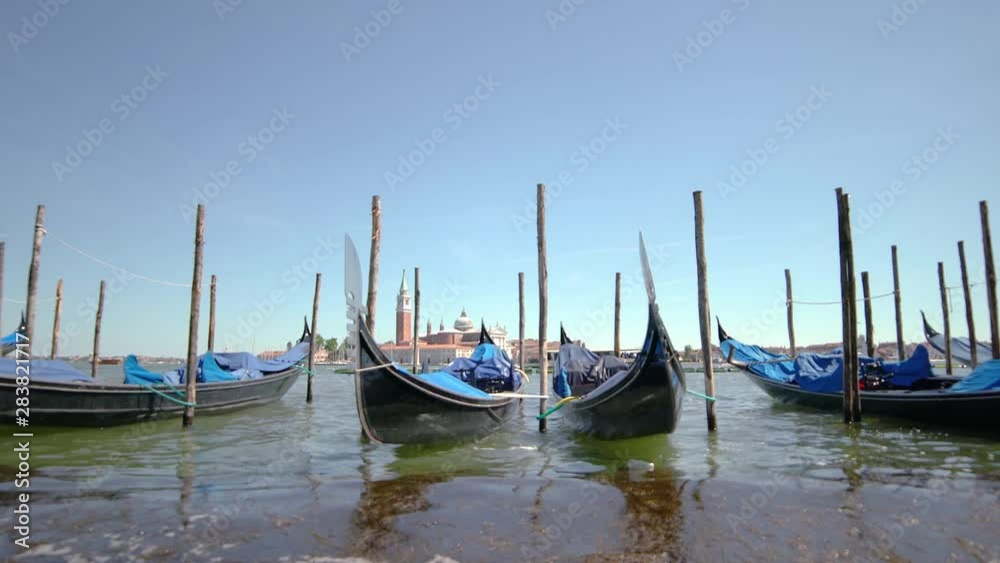 Gondolas in Venice. Beautiful sunny day blue sky the canals Gondolas in Venice. Beautiful sunny day blue sky the canals