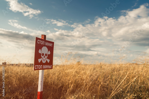 Danger Land Mines Sign. Armed conflict in Donetsk and Luhansk oblasts. Ukraine Crisis photo