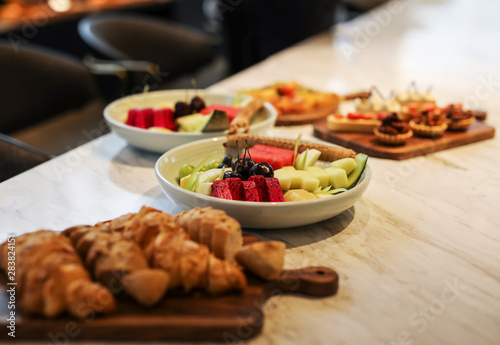 Fresh fruit served on table.