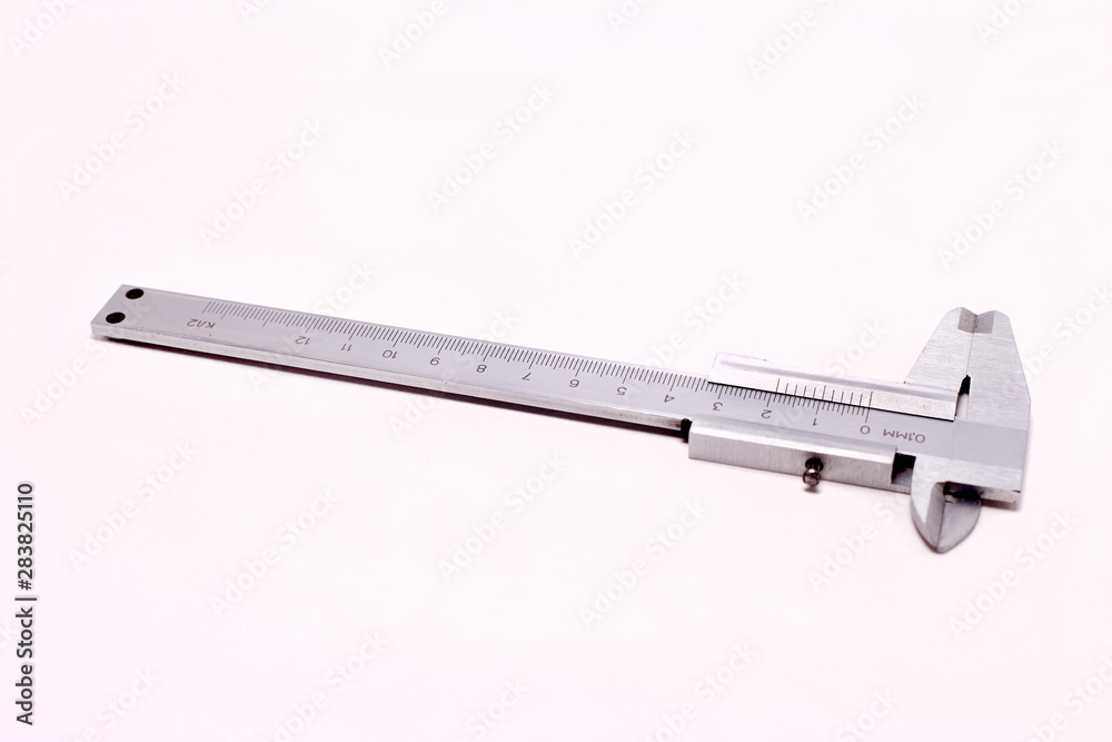 caliper, measuring tool old, on isolated background caliper, measuring tool old, on isolated background