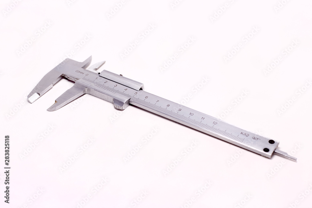 caliper, measuring tool old, on isolated background caliper, measuring tool old, on isolated background