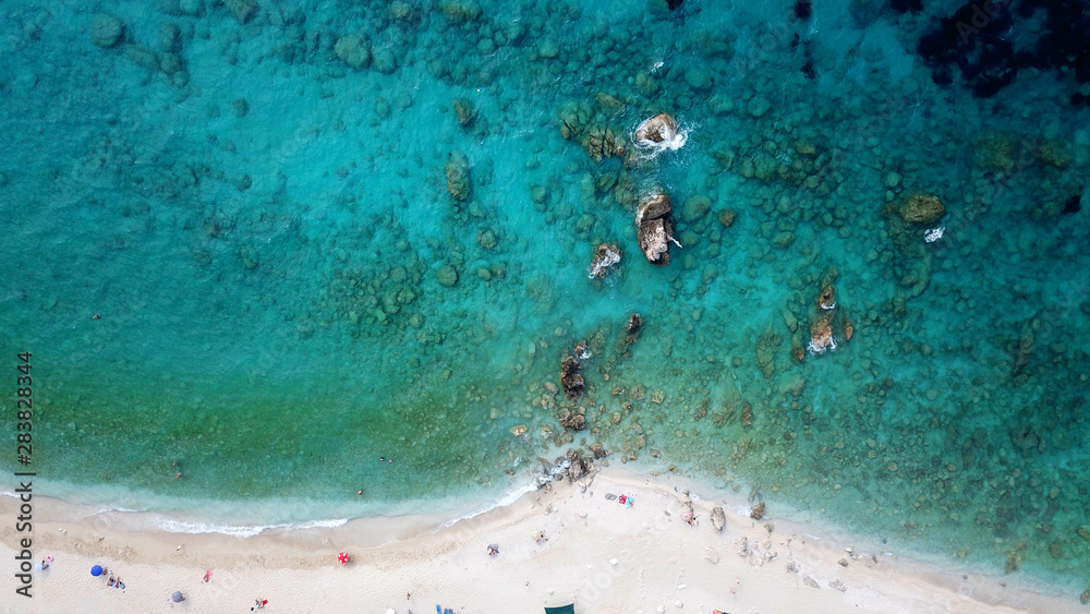 Aerial drone bird's eye view photo of tropical caribbean paradise rockybay with turquoise clear sea