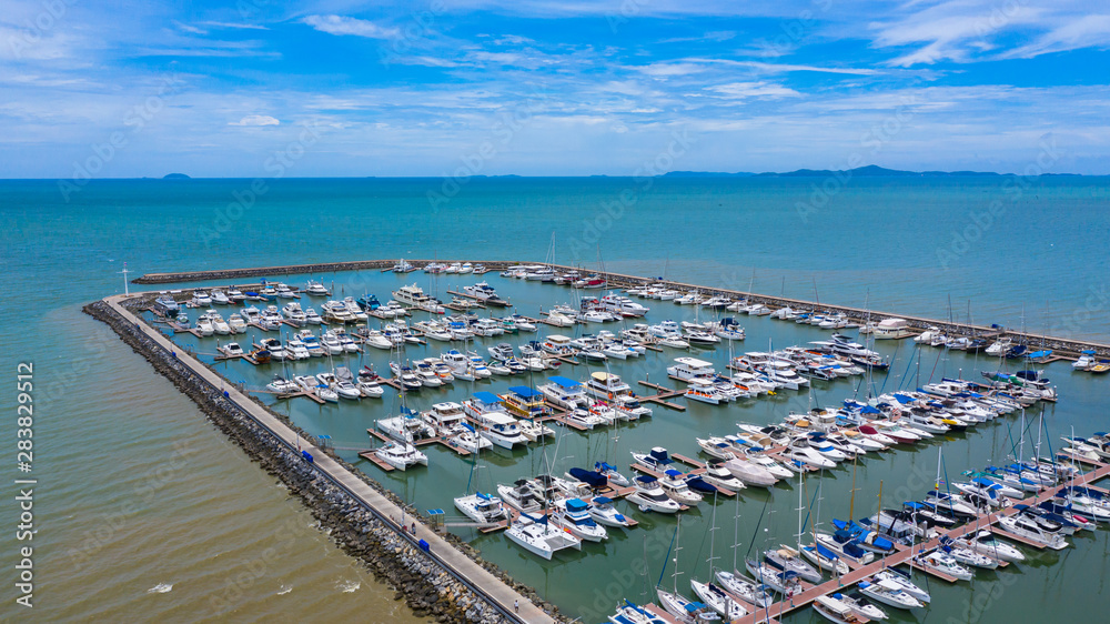 Aerial view of yachts and boat berthed in the marina, Yacht parking, marina lot, Yacht and sailboat is moored at the quay.
