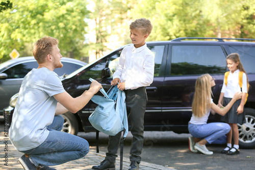 Parents getting their child...
