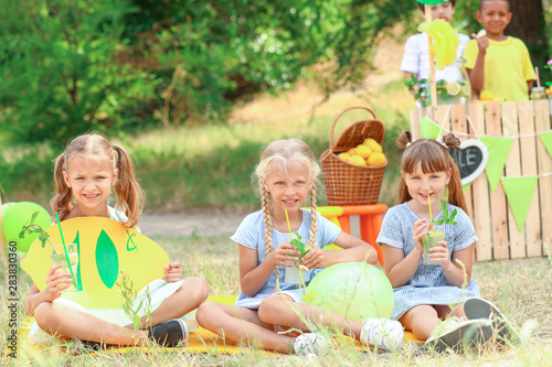 Cute little children sellin...