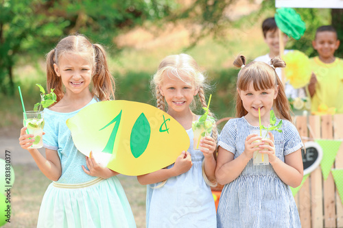 Cute little children sellin...