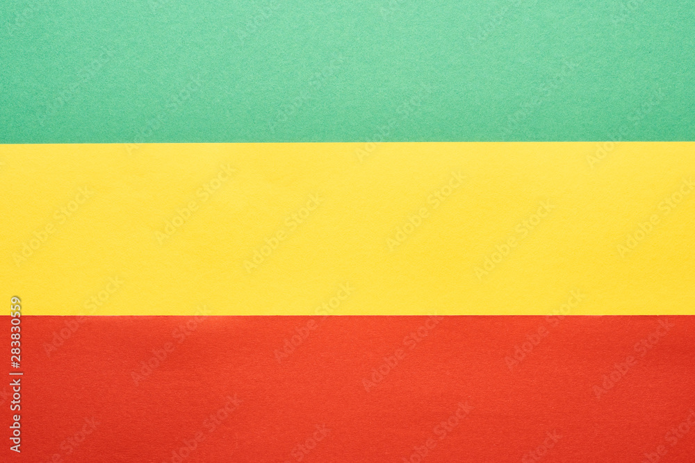 top view of colorful green, yellow and red Rastafarian flag