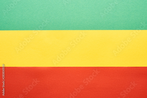 top view of colorful green, yellow and red Rastafarian flag