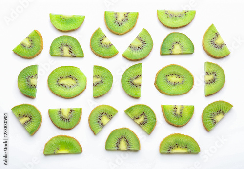 Slices of ripe kiwi on white background