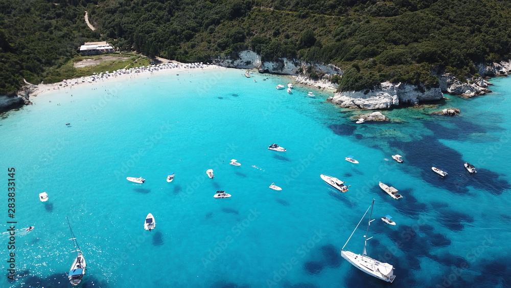 Obraz premium Aerial drone photo of tropical Caribbean bay with white sand beach and beautiful turquoise and sapphire clear sea