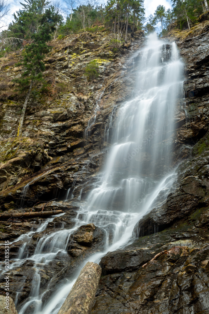 Naklejka premium Scorus waterfall, Valcea county, Romania