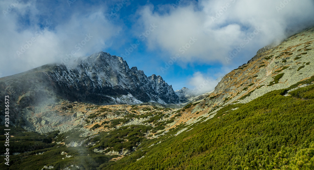 Mountain peaks with beautiful sky. High Tatry. Slovakia. Mountain peaks with beautiful sky. High Tatry. Slovakia.