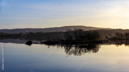 Hills and islands reflected in Lough Corrib