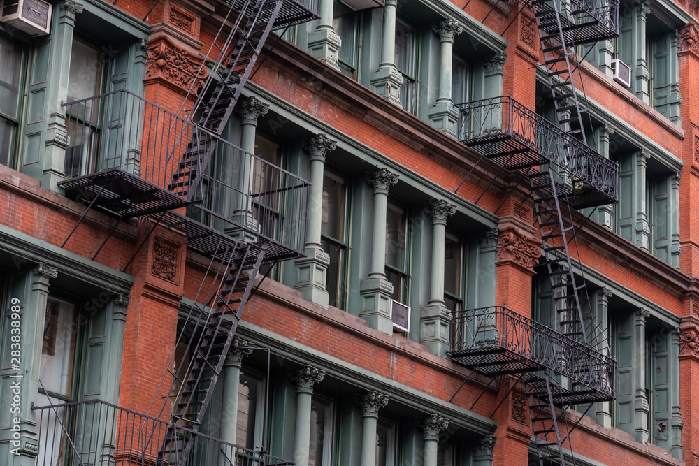 Εκτύπωση καμβά A fire escape of an apartment building in New York city.