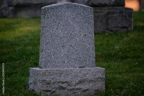 Blank Grey Tombstone Close-up in Graveyard