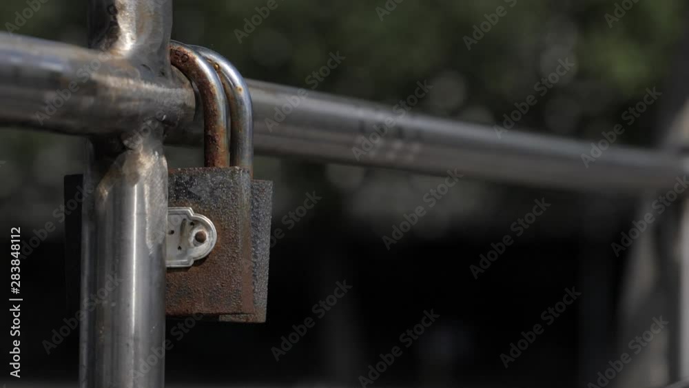 A couple of locks starting a new section on a bridge. Also known as love locks