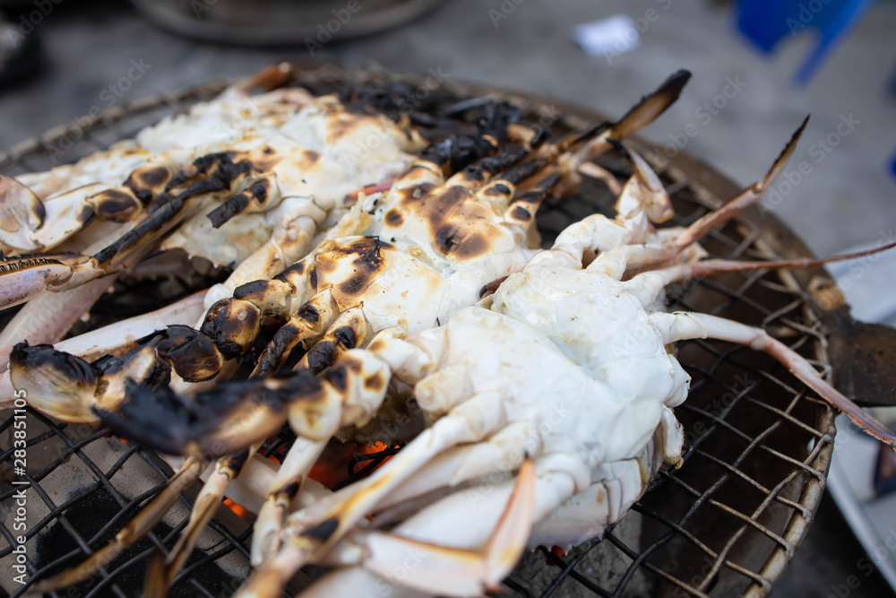 Grilled blue crabs on charcoal Grilled blue crabs on charcoal