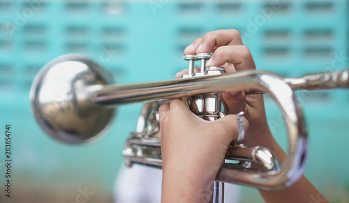 Young student Musician playing the Trumpet with Music practice, Musical concept