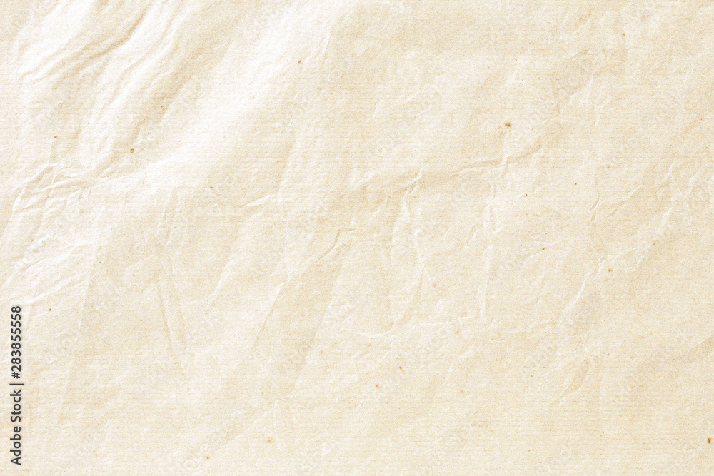 Old pale brown crumpled paper background texture Old pale brown crumpled paper background texture