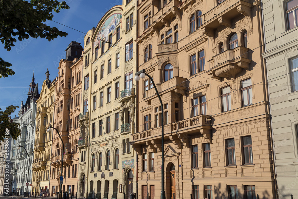 View of old residential buildings along the Rasinovo nabr. street in Prague, Czech Republic, on a sunny day.