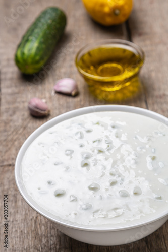 Tzatziki sauce made of yogurt, cucumbers, garlic and olive oil. National Greek cuisine. 