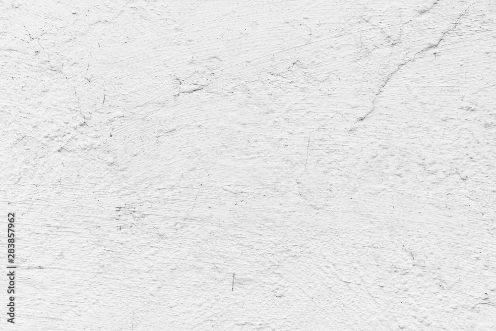 Fototapeta premium Texture of a concrete wall with cracks and scratches which can be used as a background