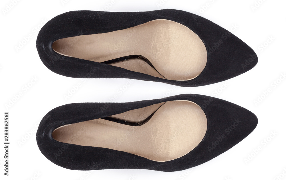 Female shoes on a white background. Top view. Female shoes on a white background. Top view.