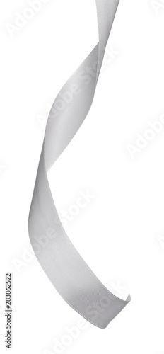Vertical silver satin ribbon isolated on white background