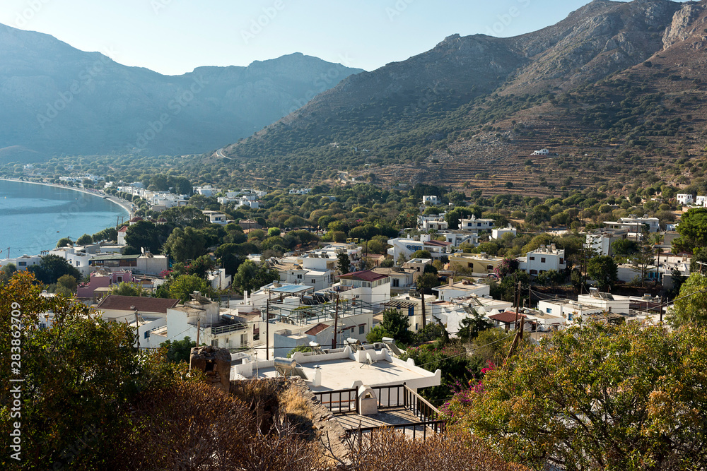 Fototapeta premium Tilos island - Livadi village on a summer morning, Aegean sea, Dodecanese Islands, Greece