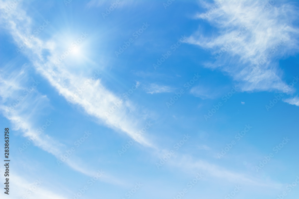 Blue sky with clouds background. Beautiful white fluffy clouds on a light blue sky background. Clearing day and Good weather in the morning. Blue sky with clouds background. Beautiful white fluffy clouds on a light blue sky background. Clearing day and Good weather in the morning.
