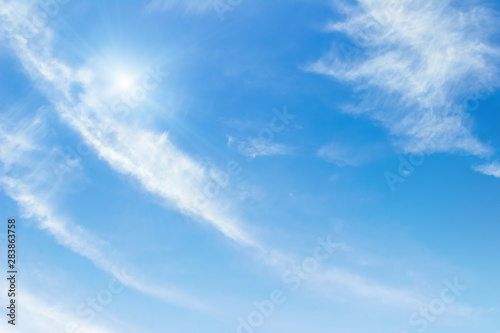 Fototapeta Naklejka Na Ścianę i Meble -  Blue sky with clouds background. Beautiful white fluffy clouds on a light blue sky background. Clearing day and Good weather in the morning.
