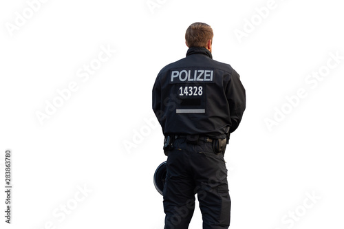 Rear view of an isolated berlin policeman