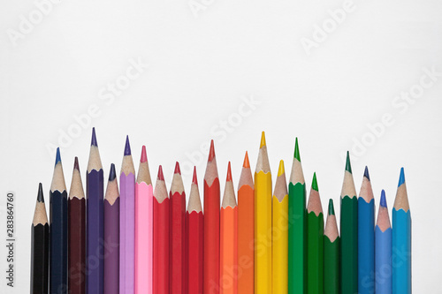 Color pencils isolated on white background, close up. copy space, sharpened pencil, education concept